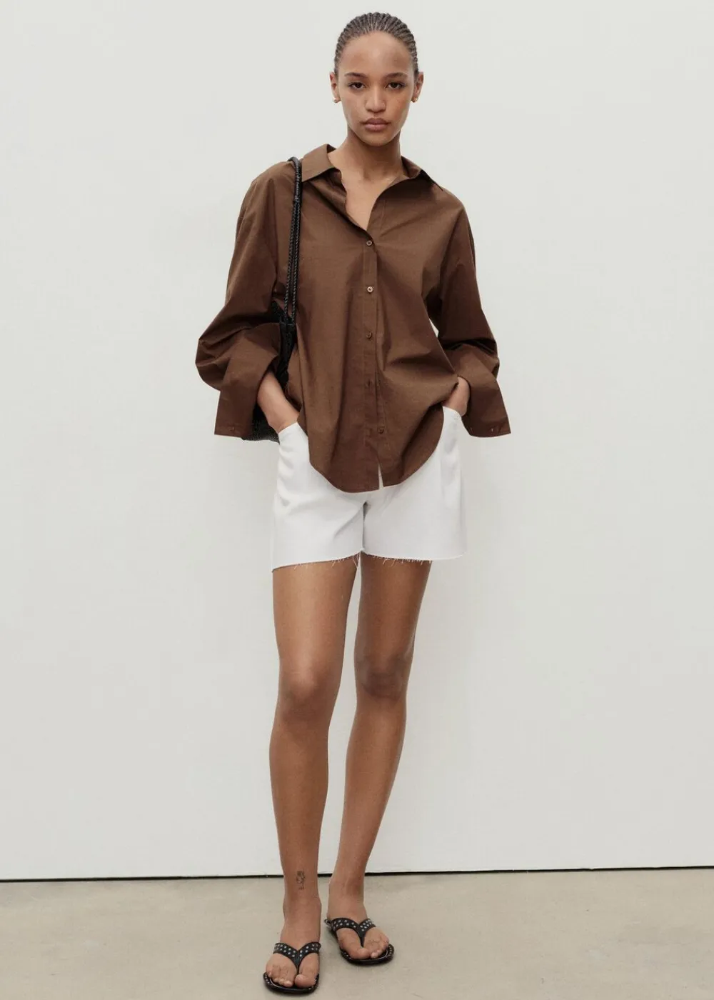 Denim shorts with frayed hem and pl>MANGO