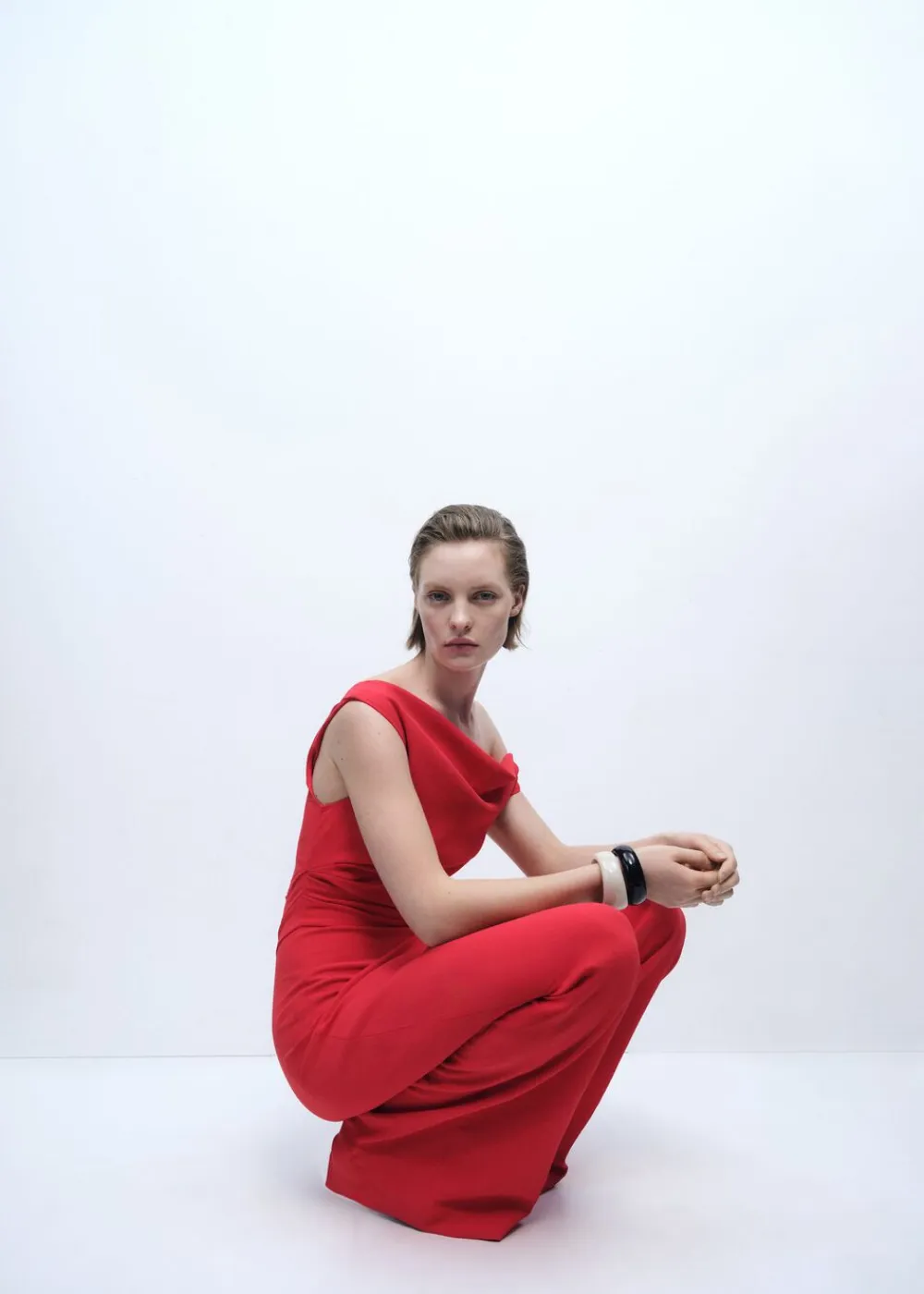Dame MANGO Long asymmetrical draped jumpsuit